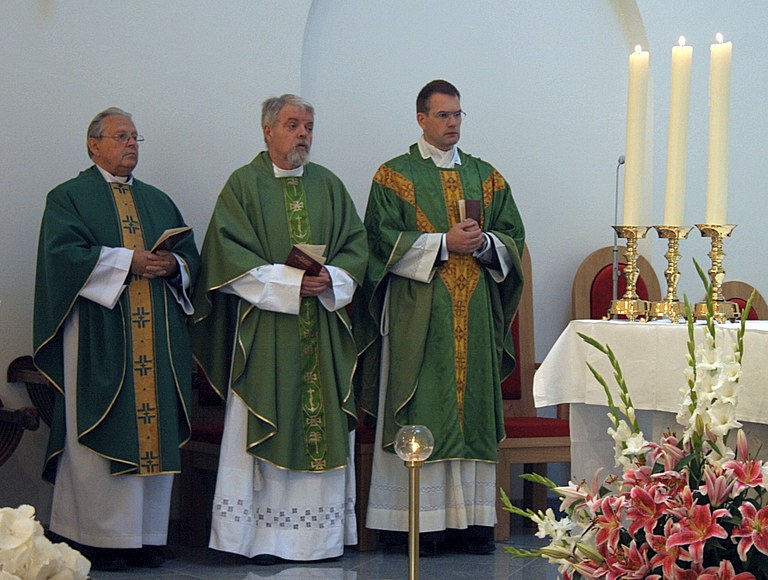En troika av sogneprester i St. Svithun menighet
