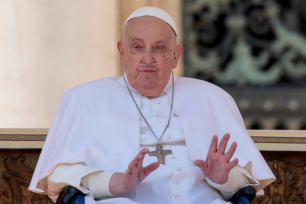 Pope Francis gestures as he appears for the first time since his return to the Vatican, in Saint Peter square, at the Vatican, April 6, 2025